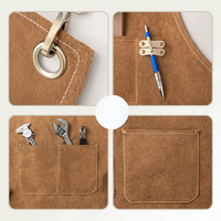 Canvas-Arbeitsschürze mit Kreuzträgern und mehreren Taschen