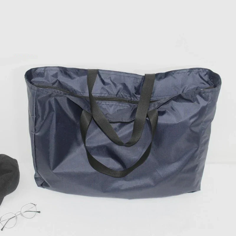 Faltbare Wasserfeste Reisetasche – 4 Größen, Schwarz oder Blau