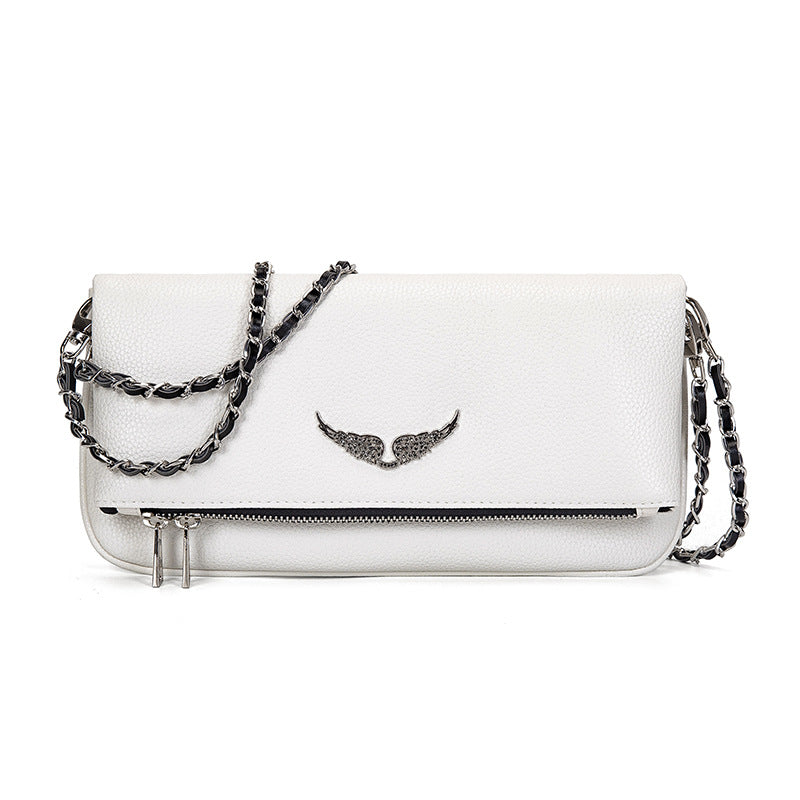 Gesteppte Clutch mit Kettentrageriemen – Elegant und vielseitig
