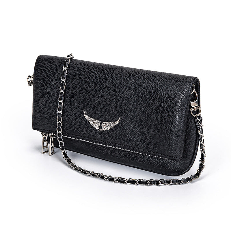 Gesteppte Clutch mit Kettentrageriemen – Elegant und vielseitig